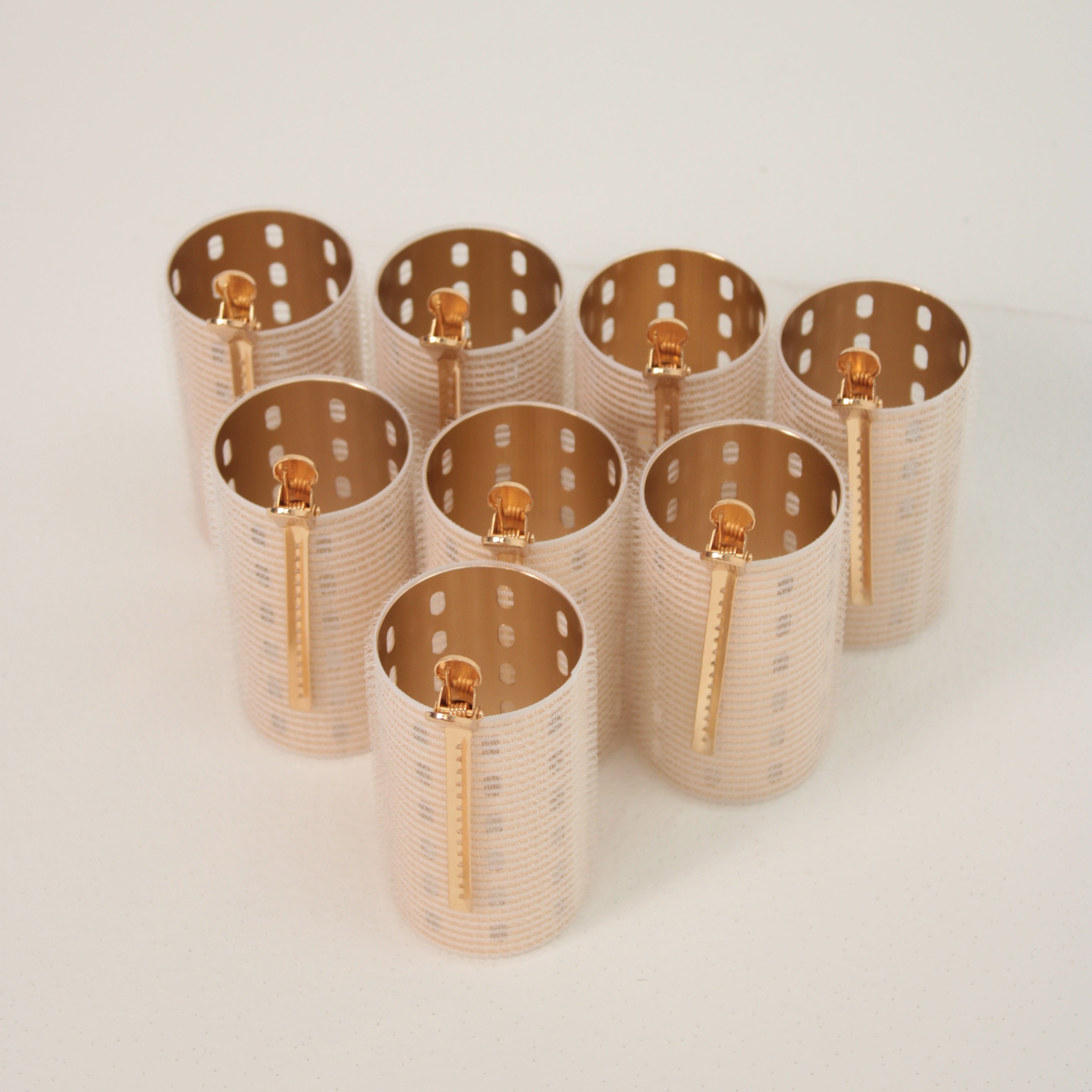 eight gold velcro hair rollers with gold creaseless clips